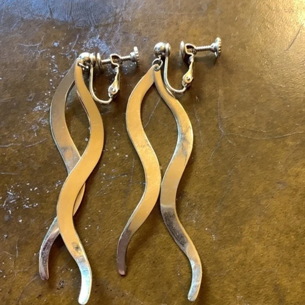 Long Gold swirl Screw back earrings